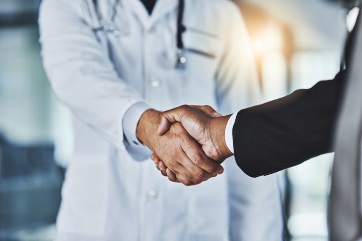 Ophthalmologist Handshake Selling Your Eye Practice Feels Great List Your Practice for Sale with OjO Ophthalmology jobs Online Sell your ophthalmology practice